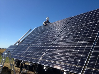 Installing LG 280-Watt solar modules on the Direct Power and Water multi-pole mount rack