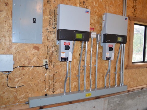 Two SMA 5000TL-US Sunny Boy inverters convert the solar array's DC power to AC for the home