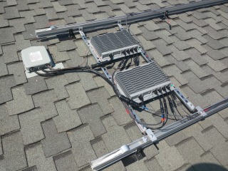 2 of the 7 Outback ProHarvest string inverters - mounted directly to the solar racking!