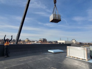 Lifting the modules onto the roof